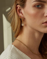 ALAIA CROISSANT HUGGIE HOOPS