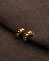 ALAIA CROISSANT HUGGIE HOOPS