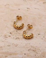 ALAIA CROISSANT HUGGIE HOOPS