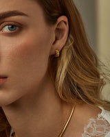 ALAIA CROISSANT HUGGIE HOOPS