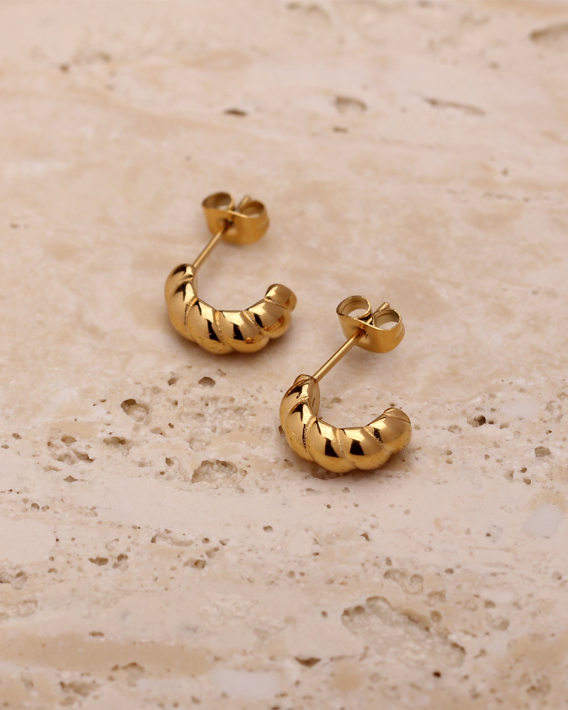 ALAIA CROISSANT HUGGIE HOOPS